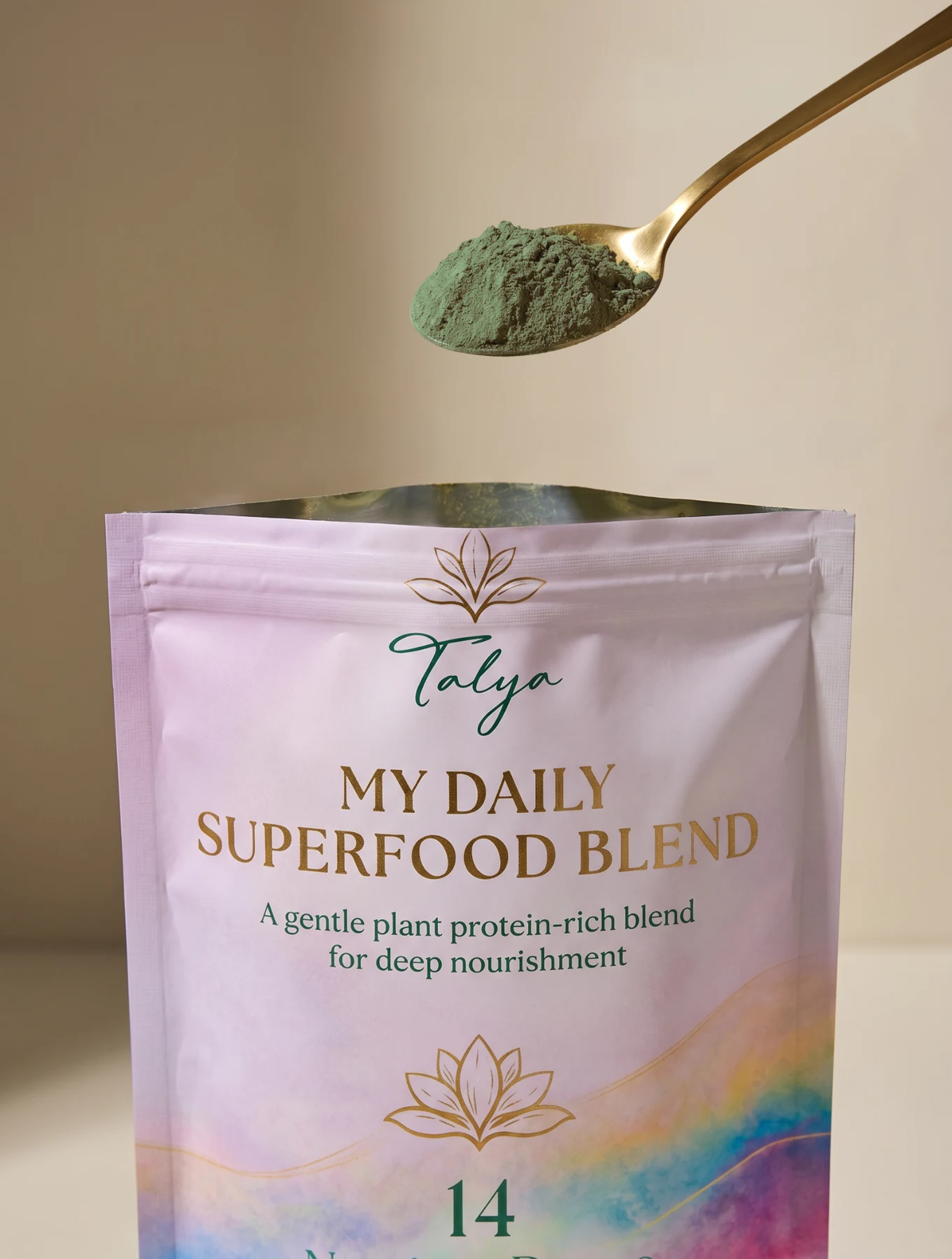 Gold spoon holding superfood powder above the lavender pouch